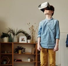 Photo of Boy Using Vr Headset